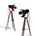 Two Red And Black Floor Lamps With Wooden Tripod Bases And Barn Door Shades