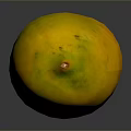 Ripe Yellow Papaya With Green Top On Dark Reflective Surface