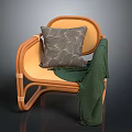 Modern Light Brown Rattan Leisure Chair with Gray Wavy Pattern Cushion and Green Blanket