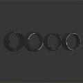 Four Shiny Black Tires With Brand Logos Arranged In A Row