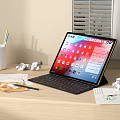 Tablet With Keyboard On Wooden Desk Displaying Apps For Productive Workspace With Office Supplies