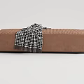 Modern Brown Sofa Bench With Tufted Surface And Black White Houndstooth Blanket