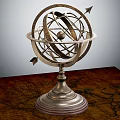 Silver Metal Decorative Ornament Set With Armillary Sphere Design And Wooden Base On Map Tabletop