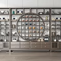 Chinese Style Display Cabinet With Circular Openwork Shelves Holding Tea Sets Books And Decorative Items