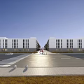 Modern Industrial Factory Exterior With Large Glass Windows Roadway And Vehicles