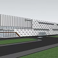 Modern Geometric Sales Office Building With Glass Curtain Walls And Illuminated Dusk Exterior Surrounding Trees