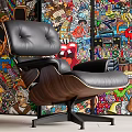 Classic Black Leather Single Chair With Wooden Armrests And Metal Base Against Colorful Graffiti Wall