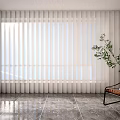 White Vertical Blinds In Bright Interior With Marble Floor And Green Plant