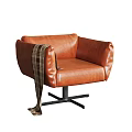 Stylish Orange Leather Accent Chair with Plaid Throw and Black Metal Swivel Base