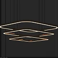 Elegant Modern Gold Three Tier Ring Chandelier Hanging In Interior Space