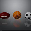 Red Football Orange Basketball And Black White Soccer Ball On Reflective Surface