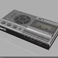 Vintage Cassette Recorder Design With Light Gray Body Speaker Grille And Control Buttons