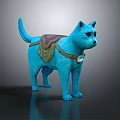 Blue Cat Like Creature Sculpture Featuring Green Cloth Saddle And White Ornament Details