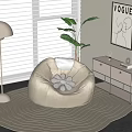 Beige Single Sofa with Flower Shaped Cushion Floor Lamp Green Plant and Wave Patterned Rug