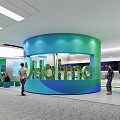 Holma Exhibition Hall Interior Featuring Curved Display Wall Visitors And Digital Screens
