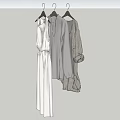 Neutral Colored Clothing Hanging on Hangers Including Long Dress and Long Sleeve Tops
