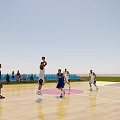 Basketball Gym With Wooden Floor Court Players Playing Basketball Game And Spectators In Blue Seating 3d model
