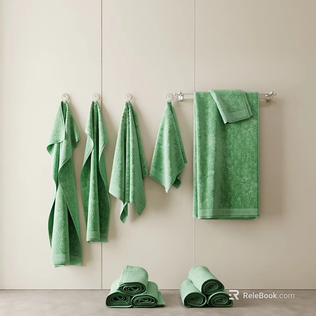 Set of Green Towels Hanging On Metal Hooks Against Beige Wall In Bathroom 3d model 
