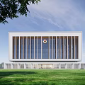 Modern Office Building With Central Badge Large Glass Windows Lawn And Green Trees