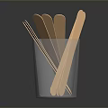 Wooden Stirrers in Transparent Glass Cup for Daily Household Use