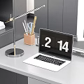 Modern Laptop On Desk With Lamp Pencils Scissors And Books For Home Office Workspace