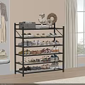Black Multi Tiered Shoe Rack Organizing Various Shoes Home With Decorative Items On Top