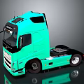 Turquoise Volvo Truck With Modern Sleek Cab And Reflective Tractor Unit