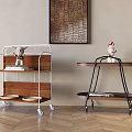 Modern Stylish Side Tables With Wooden Tabletops Metal Frames Wheels And Decorative Figurines