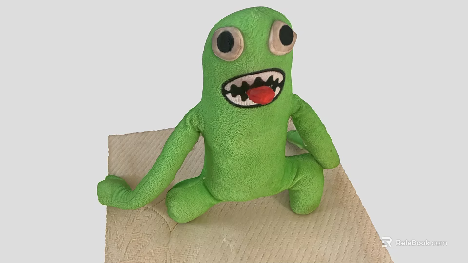 Green Plush Game Movie Character Sitting With Big Eyes Open Mouth And Teeth 3d model 