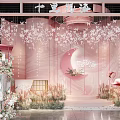 Pink Themed Event Setup With Moon Decoration Flamingos And Flower Arrangements