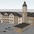 Large Brick Building Featuring Clock Tower And Multi Story Exterior Design