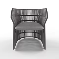 Modern Woven Rattan Leisure Chair with Dark Frame and Gray Cushion Design