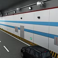 Tunnel Road Facilities With Blue Striped Walls Lighting Ventilation And Lane Markings