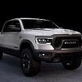 White Ram 1500 Crew Cab Pickup With Off Road Tires And Black Wheels