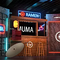 Vibrant Neon Ramen Shop Interior With MUMA Sign Bar Counter Stools And Brick Walls