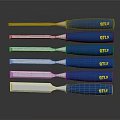 Set of Woodworking Chisels With Blue Handles And Yellow MTLS Labels