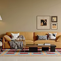 Orange Sofa and Black Coffee Table Set with Decorative Pillows Colorful Rug and Wall Art