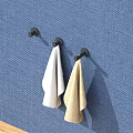 Practical Kitchen Hooks With Towels On Blue Textured Wall And Wooden Countertop Edge