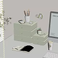 Organized Desk With Green Storage Drawers Colored Pencils Notebook And Potted Plant
