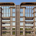Modern Luxury Residential Building Exterior With Balconies Greenery And Lounge Chairs