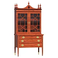 Traditional Wooden Cabinet With Glass Doors Drawers Golden Handles And Decorative Top
