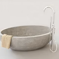 Gray Concrete Bathtub With Silver Faucet And Beige Towel On Edge