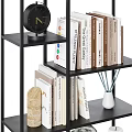 Modern Black Metal Shelf Unit With Stacked Books Decorative Vases And Sculptures