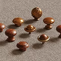 Elegant Cabinet Knobs With Wooden And Brass Decorative Designs For Furniture Drawers