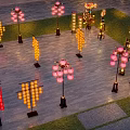 Colorful Illuminated Lanterns With Traditional And Modern Designs On Stone Path And Grass
