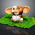 Cute Brown And White Furred Creature Figurine With Big Ears Sitting On Green Leaf