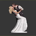 Wedding Couple Figurine Embracing And Kissing In Attire