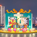 Christmas Gift Box Decoration With Yellow Ribbon Snowflakes And Candles In City Night View