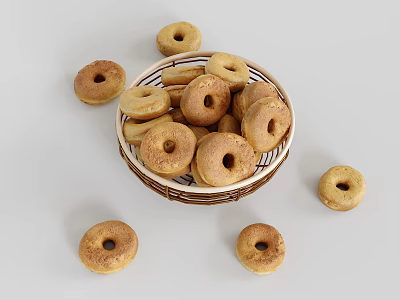 Golden Brown Donuts in Wicker Basket with Scattered Pieces Around 3d model