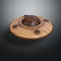 Wooden Decorative Disc With Central Dark Wooden Accent Surrounded By Circular Details On Smooth Surface